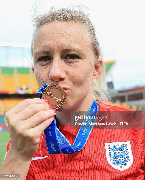 Laura Bassett of England celebrates her teams third place after defeating Germany during the FIFA Women's World Cup 2015 Third Place Play-off match...