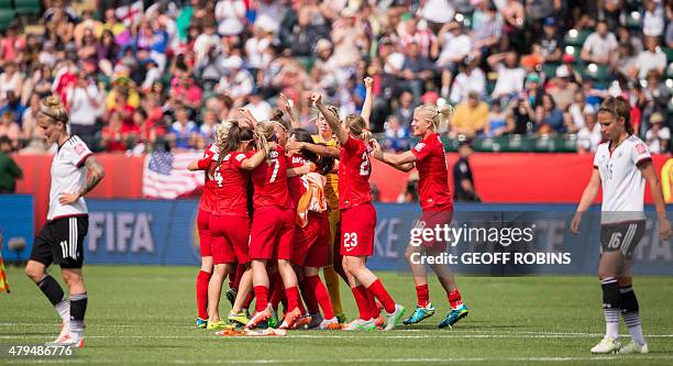 England's players celebrate their 1-0 win over Germany in the bronze medal match against Germany at the FIFA Women's World Cup in Edmonton, Canada on...