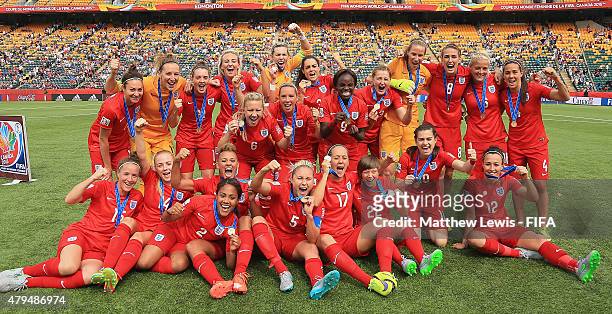 England celebrate their third place win over Germany after the FIFA Women's World Cup 2015 Third Place Play-off match between Germany and England at...