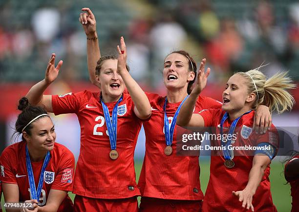 England players celebrate their third place after the FIFA Women's World Cup Canada 2015 Third Place Play-off match between Germany and England at...