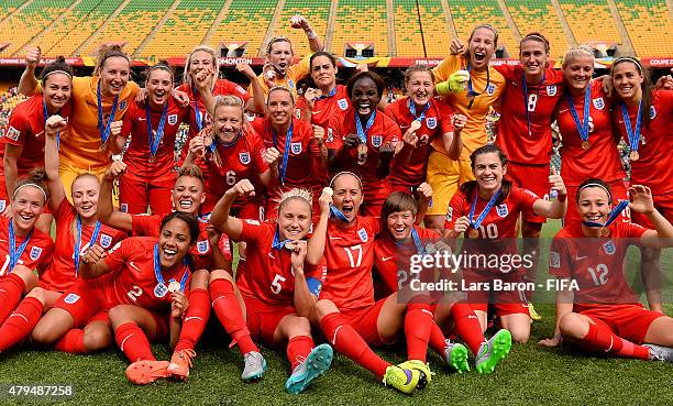 Players of England celebrate after winning the FIFA Women's World Cup 2015 Third Place Play-off match between Germany and England at Commonwealth...