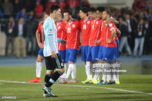 Lionel Messi of Argentina looks dejected in the penalty shootout during the 2015 Copa America Chile Final match between Chile and Argentina at...