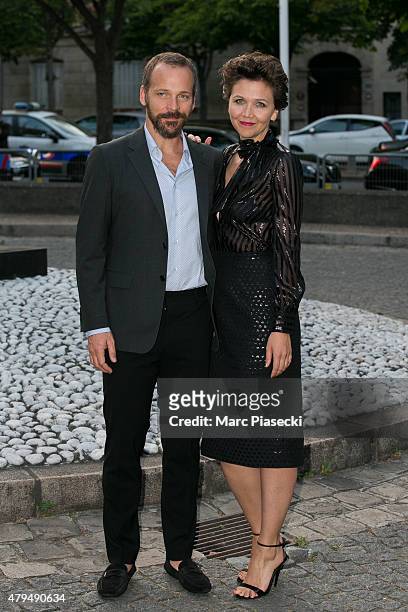 Actress Maggie Gyllenhaal and husband Peter Sarsgaard attend the Miu Miu Club launch of the first Miu Miu fragrance and croisiere 2016 collection at...