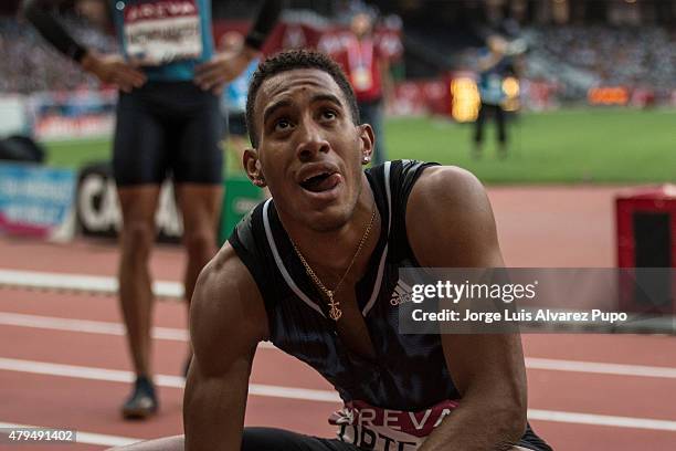 Orlando Ortega of Cuba looks at the screen announcing a 12s94 SB in the Mens 110m Hurdles during the Meeting Areva - IAAF Diamond League at Stade de...