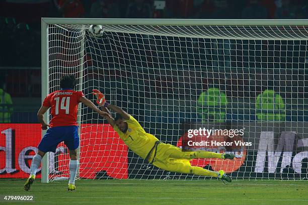 Matias Fernandez of Chile scores the first penalty kick in the penalty shootout during the 2015 Copa America Chile Final match between Chile and...