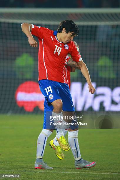 Matias Fernandez of Chile celebrates after scoring the first penalty kick in the penalty shootout during the 2015 Copa America Chile Final match...