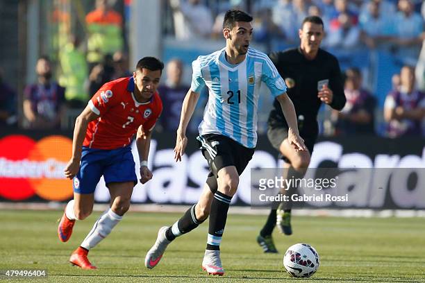 Javier Pastore of Argentina fights for the ball with Alexis Sanchez of Chile during the 2015 Copa America Chile Final match between Chile and...