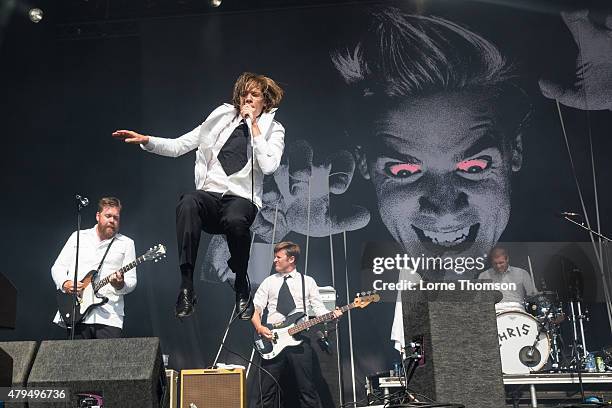 Mikael Karison, Howlin' Pele Almqvist, Mattias Bernvall and Christian Grann of The Hives perform at Clapham Common on July 4, 2015 in London, England.