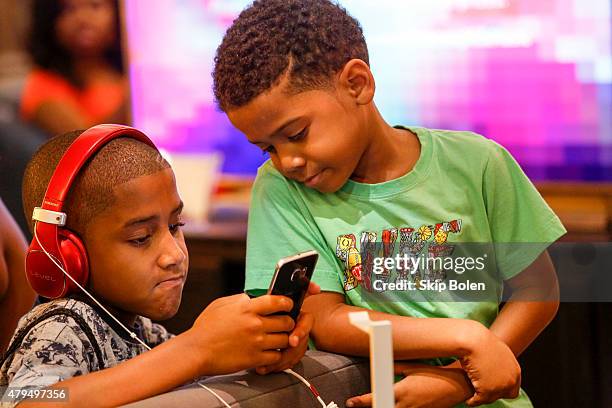 Festivalgoers attend the Samsung Galaxy Experience at the ESSENCE Festival on July 4, 2015 in New Orleans, Louisiana.