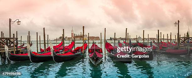 gondolas in venice, italy - saint mark stock pictures, royalty-free photos & images