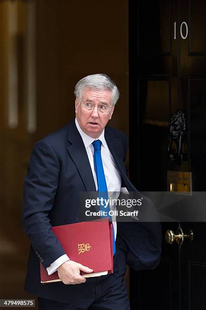 Business Minister Michael Fallon leaves Downing Street on March 19, 2014 in London, England. The Chancellor of the Exchequer will deliver his Budget...