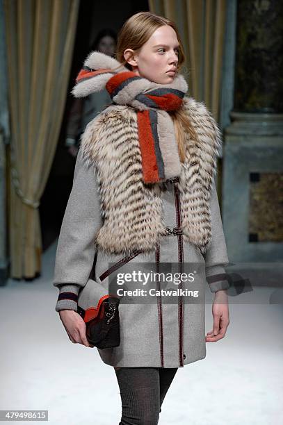 Model walks the runway at the Fay Autumn Winter 2014 fashion show during Milan Fashion Week on February 19, 2014 in Milan, Italy.