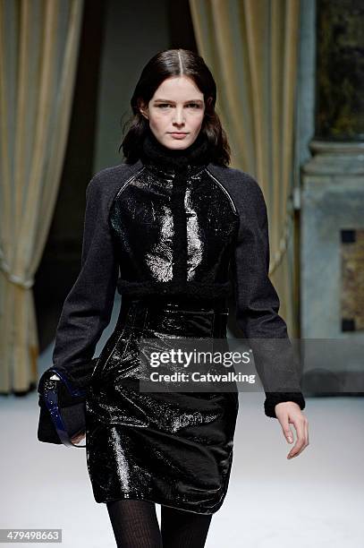 Model walks the runway at the Fay Autumn Winter 2014 fashion show during Milan Fashion Week on February 19, 2014 in Milan, Italy.