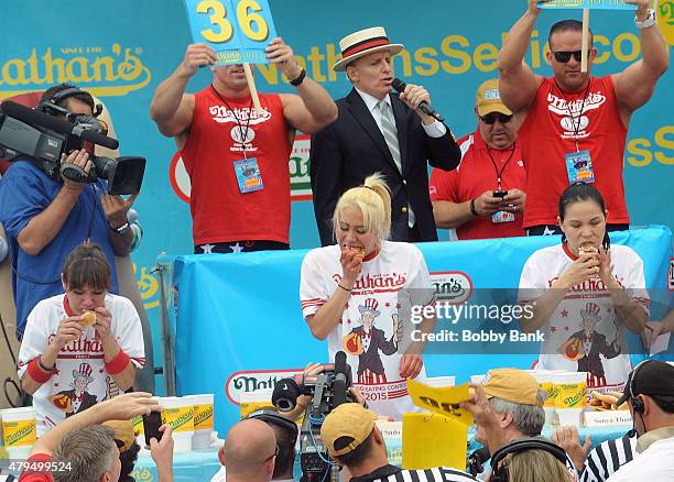 Miki Sudo and Sonya Thomas attends the 2015 Nathan's Famous 4th Of July International Hot Dog Eating Contest at Coney Island on July 4, 2015 in New...