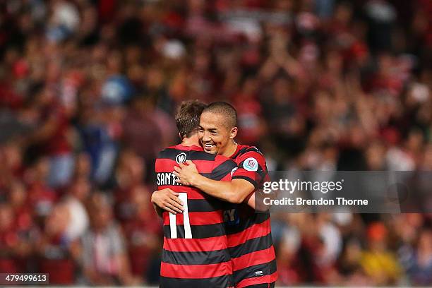 Shinji Ono and Brendon Santalab of the Wanderers celebrate at full time following the AFC Asian Champions League match between the Western Sydney...