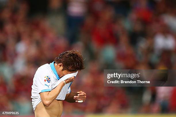 Yoshito Okubo of Kawasaki Frontale shows his frustration after a missed chance at goal during the AFC Asian Champions League match between the...