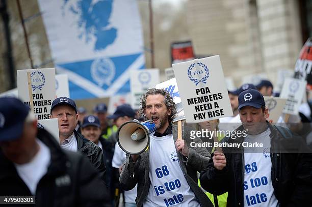 The POA march ahead of the Budget on March 19, 2014 in London, England. Later The Chancellor of the Exchequer George Osborne will deliver his Budget...