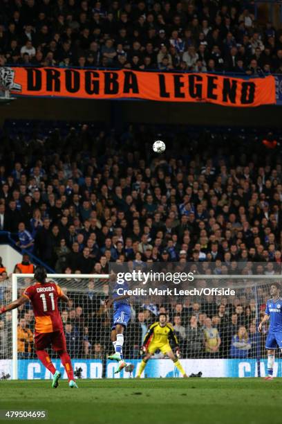 Didier Drogba of Galatasaray takes a free kick but the ball goes high over the crossbar and hits a banner declaring 'Drogba Legend' during the UEFA...