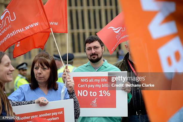 Protests against NHS cuts ahead of the Budget on March 19, 2014 in London, England. Later The Chancellor of the Exchequer George Osborne will deliver...