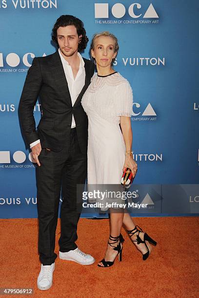 Actor Aaron Taylor-Johnson and wife filmmaker Sam Taylor-Johnson arrive at the 2015 MOCA Gala presented by Louis Vuitton at The Geffen Contemporary...