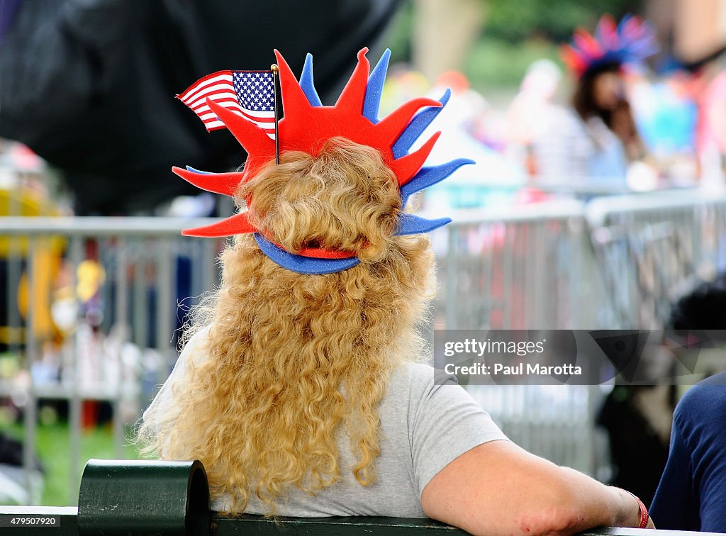 Festive hats as thousands attend the Boston Pops Fourth Of July... News