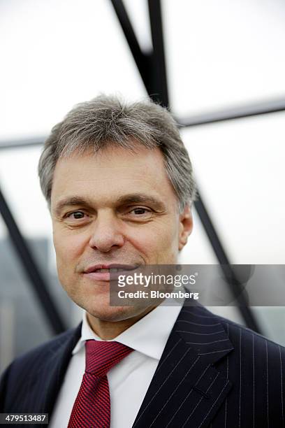 Wolfgang Schreiber, chief executive officer of Bentley Motors Ltd., poses for a photograph following a news conference to announce the company's...