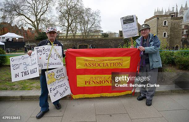 Protestors outside parliament ahead of the Budget on March 19, 2014 in London, England. The Chancellor of the Exchequer George Osborne has delivered...