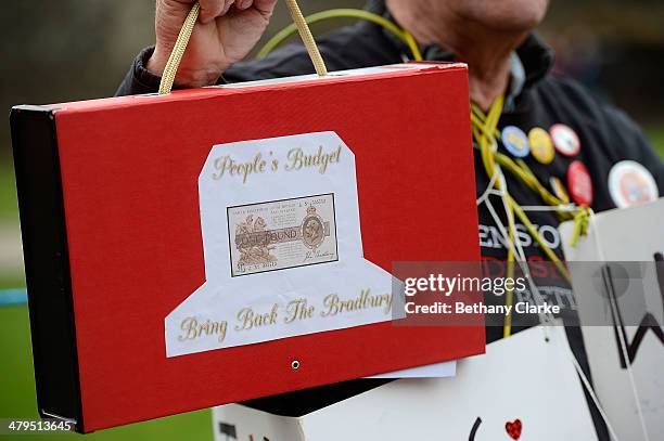 Protestors outside parliament ahead of the Budget on March 19, 2014 in London, England. The Chancellor of the Exchequer George Osborne has delivered...