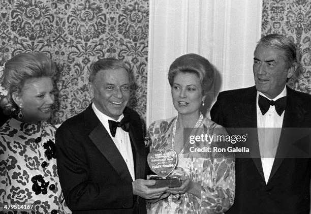 Singer Frank Sinatra and wife Barbara, actress Princess Grace Kelly and actor Gregory Peck attend the 53rd Annual Variety Clubs International...