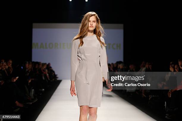 Model walks the runway wearing a creation by Malorie Urbanovitch & Matiere Noir during World Mastercard Fashion Week in Toronto on March 18, 2014....