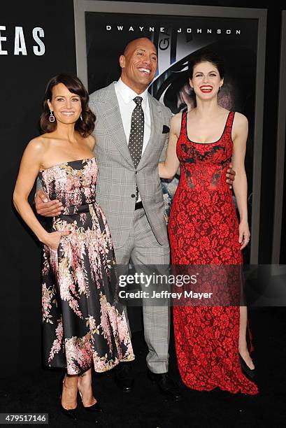 Actors Carla Gugino, Dwayne 'The Rock' Johnson and Alexandra Daddario arrive at the 'San Andreas' - Los Angeles Premiere at TCL Chinese Theatre IMAX...