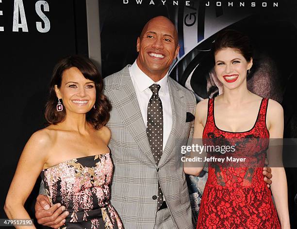 Actors Carla Gugino, Dwayne 'The Rock' Johnson and Alexandra Daddario arrive at the 'San Andreas' - Los Angeles Premiere at TCL Chinese Theatre IMAX...