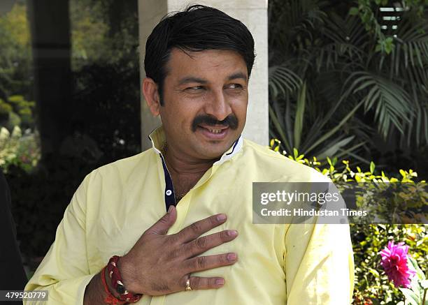 Manoj Tiwari, Bhojpuri singer-actor and BJP candidate from North East constituency for the 2014 Lok Sabha election during his interaction with the...