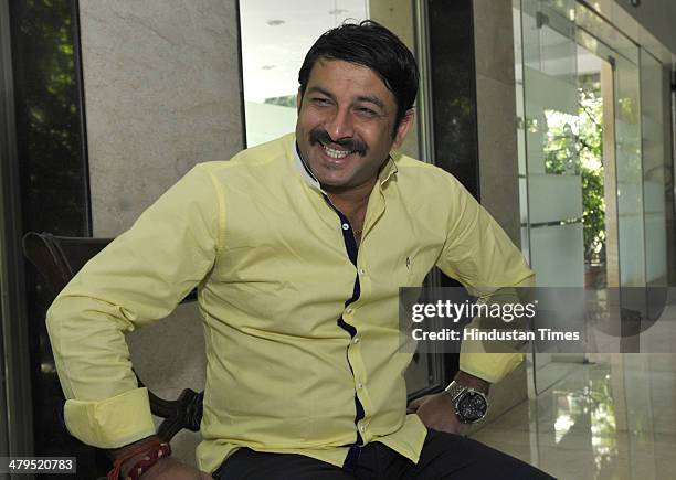 Manoj Tiwari, Bhojpuri singer-actor and BJP candidate from North East constituency for the 2014 Lok Sabha election during his interaction with the...