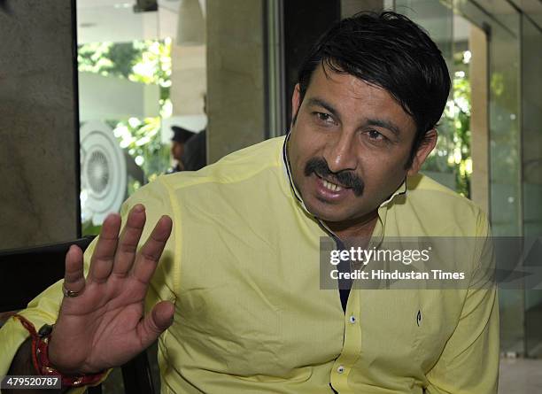 Manoj Tiwari, Bhojpuri singer-actor and BJP candidate from North East constituency for the 2014 Lok Sabha election during his interaction with the...