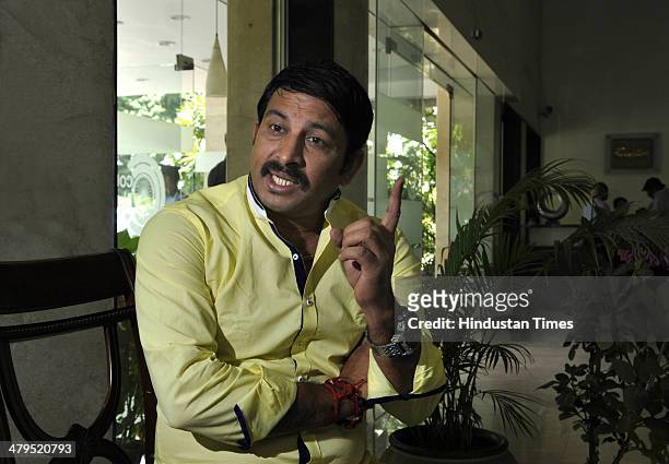 Manoj Tiwari, Bhojpuri singer-actor and BJP candidate from North East constituency for the 2014 Lok Sabha election during his interaction with the...