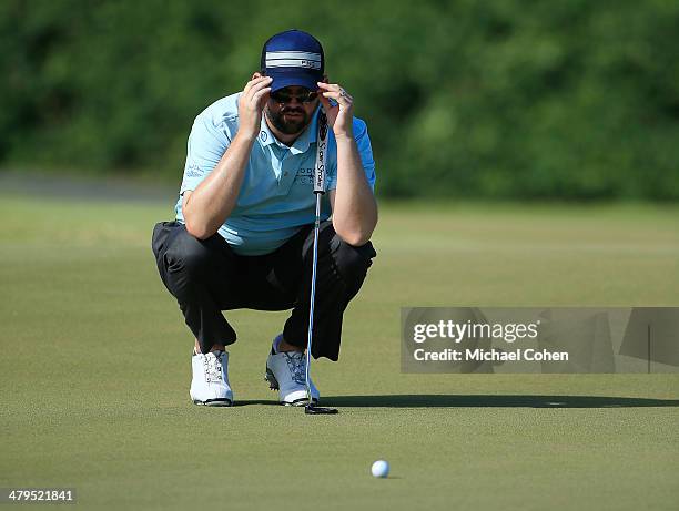 Edward Loar lines up his putt during the first round of the Puerto Rico Open presented by seepuertorico.com held at Trump International Golf Club on...