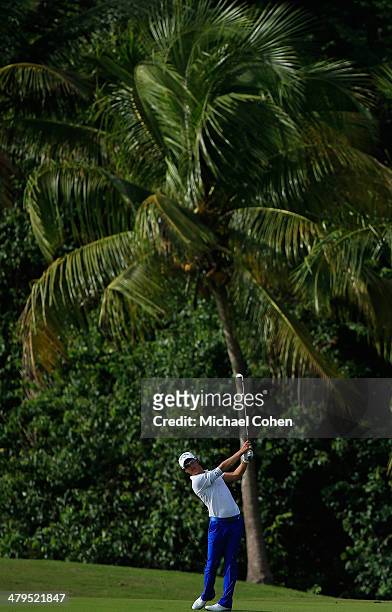 Ryo Ishikawa of Japan hits a shot from the fairway during the first round of the Puerto Rico Open presented by seepuertorico.com held at Trump...