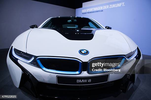 I8 plug-in hybrid automobile, manufactured by Bayerische Motoren Werke AG, sits on display during a news conference to announce the company's...