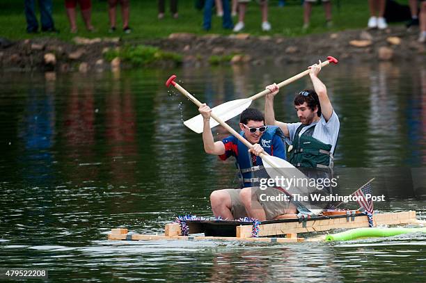 Jacob Alvarez and Bryce Meadows attempt to get rhythm in their tub dubbed the Mayshowers during the annual KEY103 Great Frederick Bathtub Races on...
