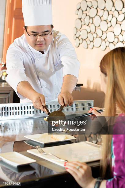 teppanyaki chef - teppanyaki stock pictures, royalty-free photos & images