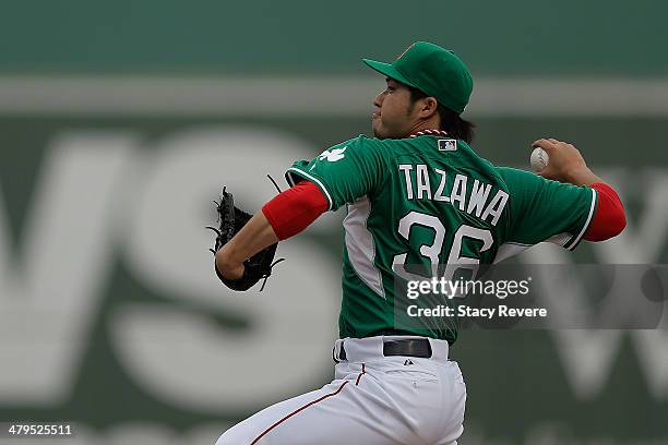 Junichi Tazawa of the Boston Red Sox throws a pitch in the ninth inning of a game against the St. Louis Cardinals at JetBlue Park at Fenway South on...