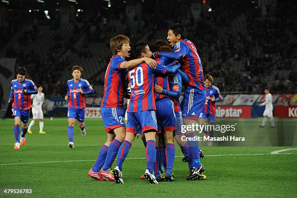 Tokyo players celebrate the first goal during the J.League Yamazaki Nabisco Cup match between FC Tokyo vs. Kashima Antlers at Ajinomoto Stadium on...