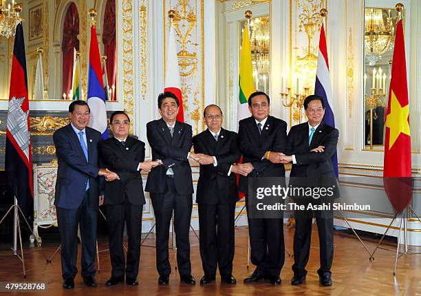 Cambodian Prime Minister Hun Sen, Laotian Prime Minister Thongsing Thammavong, Japanese Prime Minister Shinzo Abe, Myanmar President Thein Sein, Thai...