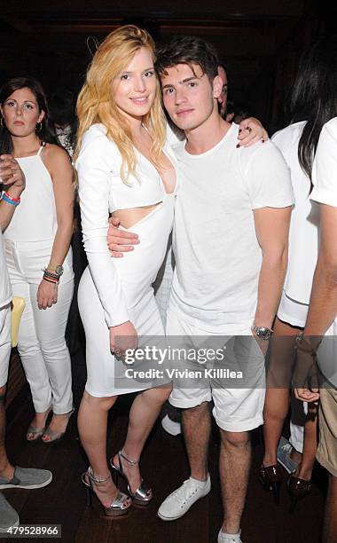 Bella Thorne and Gregg Sulkin attend the "Red, White And Bootsy" Bootsy Bellows Pop Up At Nobu Malibu on July 4, 2015 in Malibu, California.