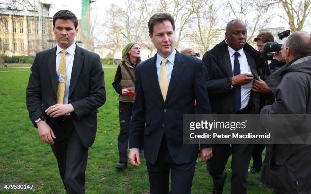 Deputy Prime Minister Nick Clegg abandons a photocall near Parliament after being harangued by a protester on March 19, 2014 in London, England. The...