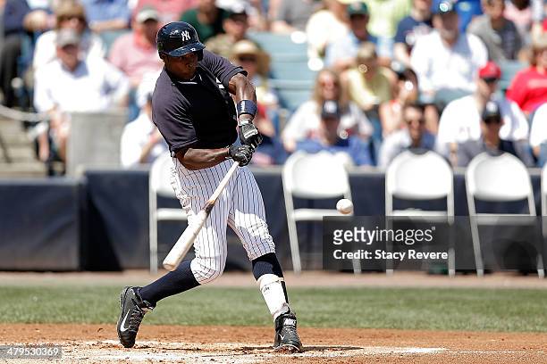 Alfonso Soriano of the New York Yankees swings at a pitch in the first inning of a game against the Boston Red Sox at George M. Steinbrenner Field on...