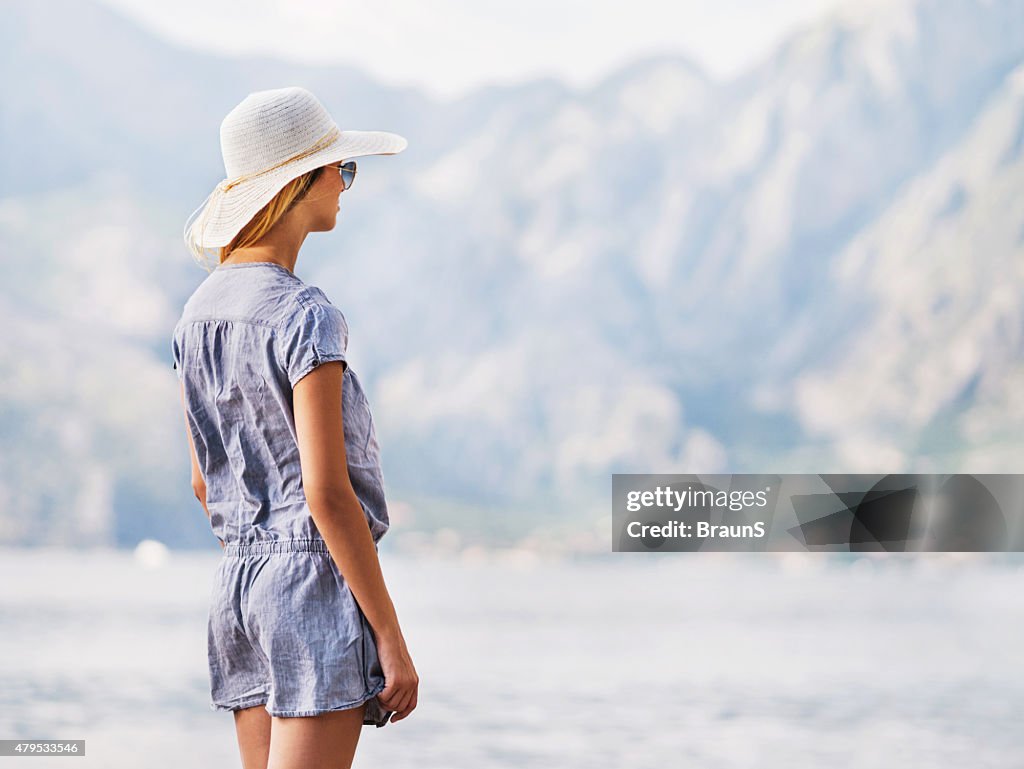 Young woman looking at the view.