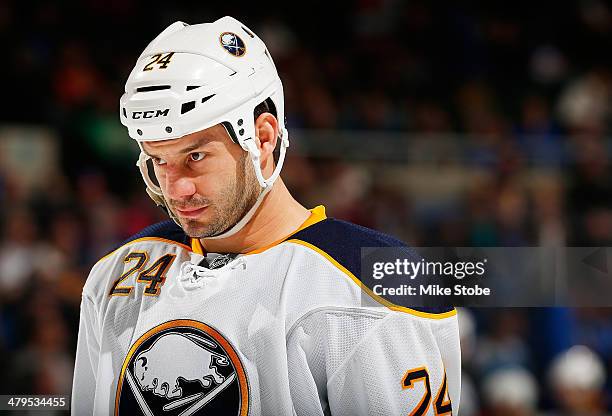 Zenon Konopka of the Buffalo Sabres skates against the New York Islanders at Nassau Veterans Memorial Coliseum on March 15, 2014 in Uniondale, New...