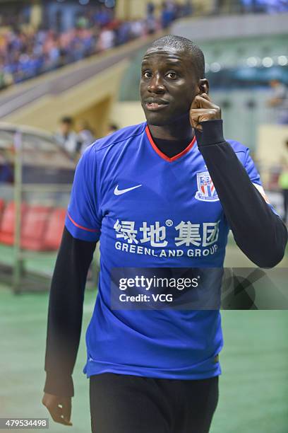 Demba Ba makes his debut prior to the CSL Chinese Football Association Super League match between Shanghai Shenhua and Guangzhou R&F at Hongkou...